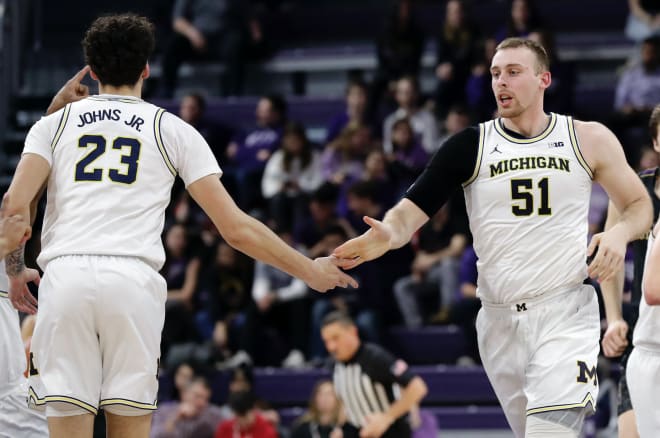 Michigan Wolverines basketball's Brandon Johns and Austin Davis.