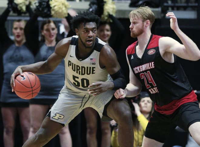 Purdue's Trevion Williams posts up.