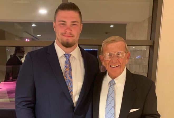 Clarkston (Mich.) High offensive lineman and Notre Dame commit Rocco Spindler with legendary Irish head coach Lou Holtz