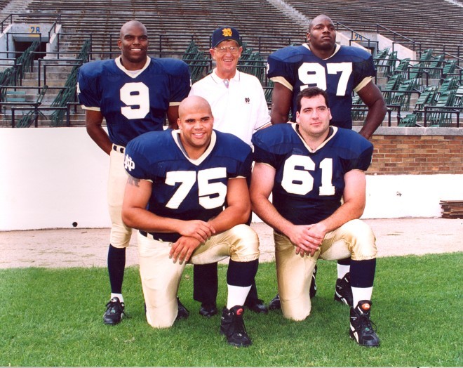 Jeff Burris (9) joined classmates Bryant Young (97), Tim Ruddy (61) and Aaron Taylor (75) as 1993 team captains.