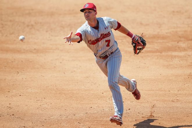 DC Arendas flips the ball to first base during Tuesday's gme vs. UNCW