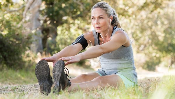 woman stretching outside