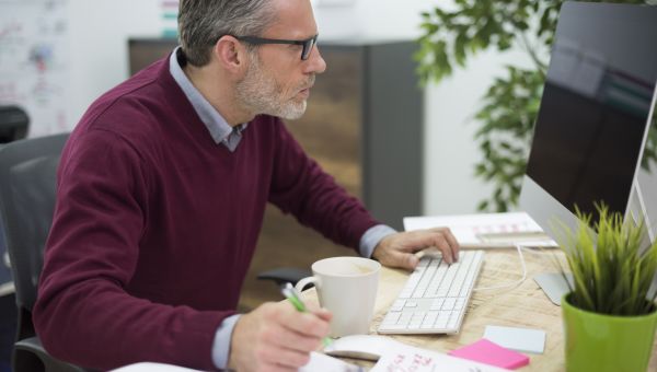 man at desk in office