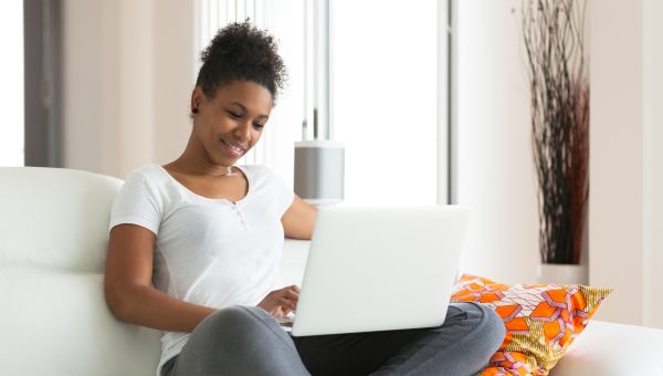 woman working on laptop at home