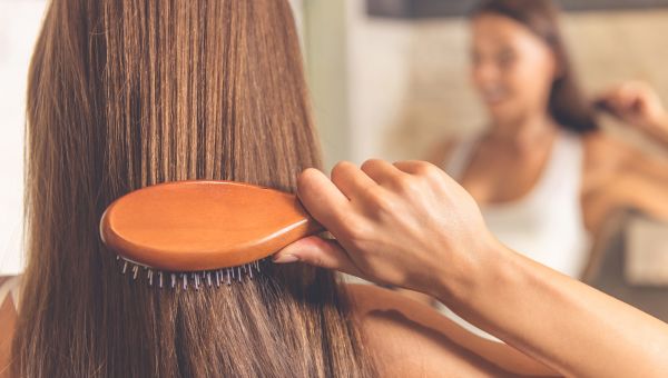 woman brushing hair