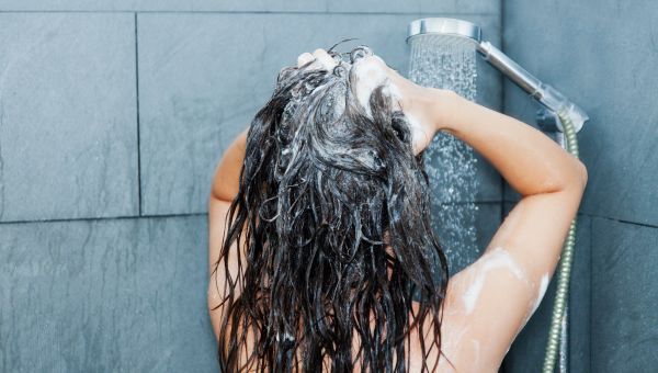 woman washing her hair 