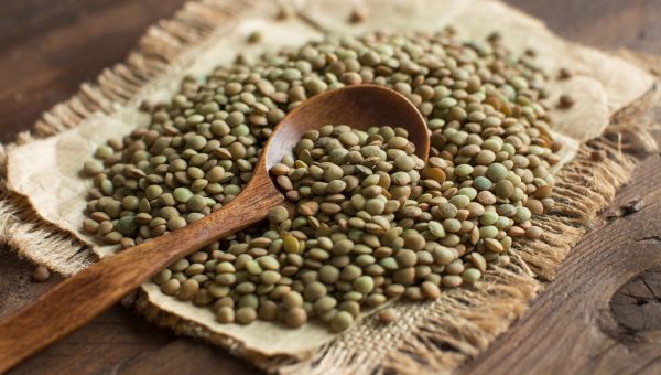 lentils, wooden spoon, pile of lentils, cloth