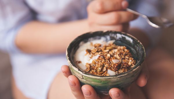 oatmeal, yogurt, small bowl, hand