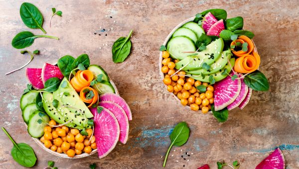 salad, colorful veggies, cucumber slices, chickpeas, spinach, leafy greens, grape fruit