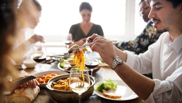 Group eating Italian food