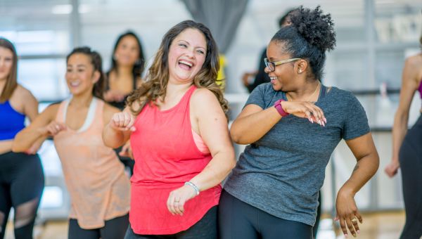 Friends dancing together