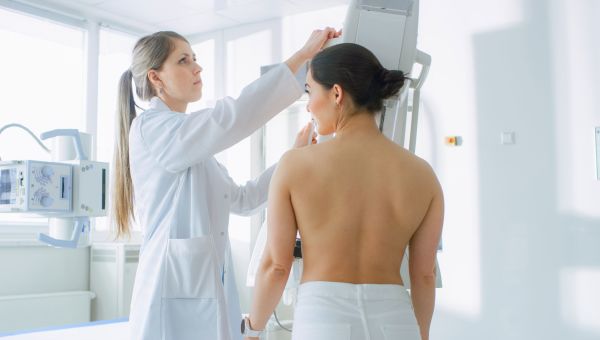 woman getting mammogram