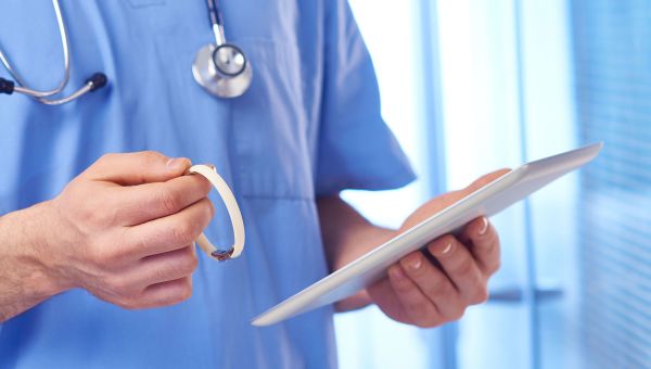 Nurse checking a patient's medical chart