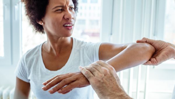 young woman with wrist pain