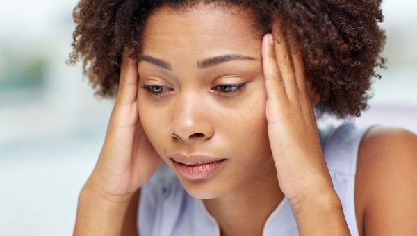 worried woman with a headache