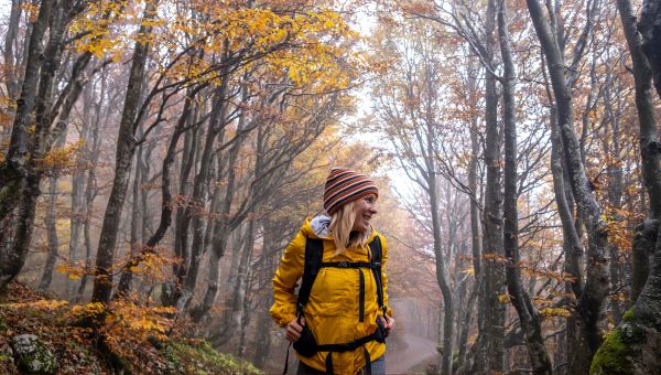 woman walking in the woods