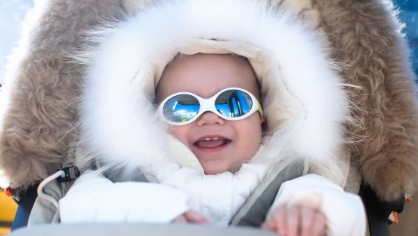 winter baby, cold outside baby in a furry hood