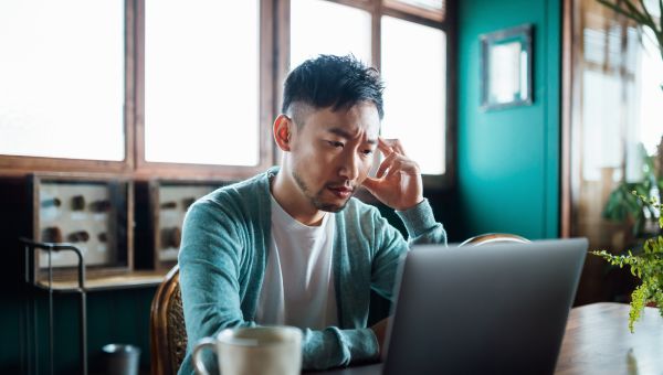 stressed man at computer