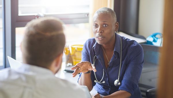 doctor advising patient