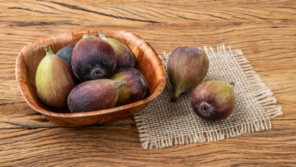 figs in a bowl on a table
