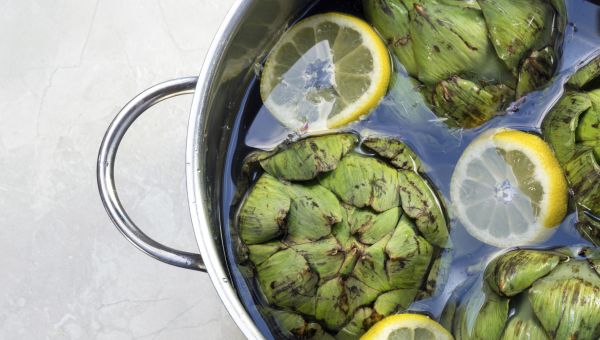 artichokes soaking in water