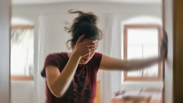 woman suffering from vertigo