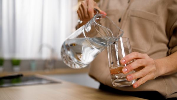 pouring pitcher of water