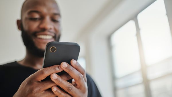 man looking at phone