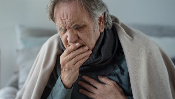 mature man sick with pneumonia