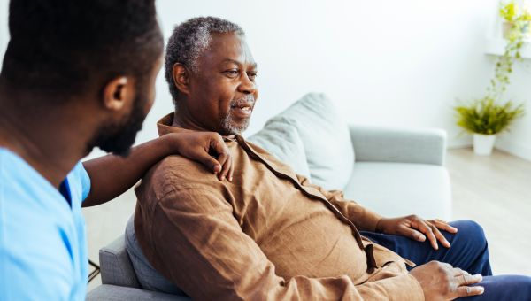 Senior man with caregiver