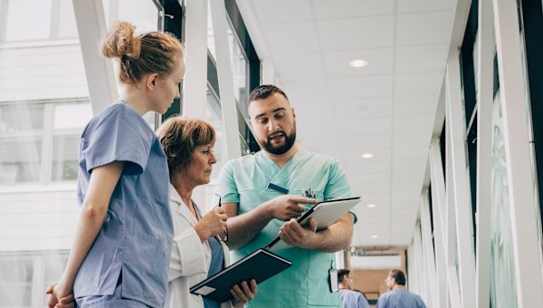 hospital medical team meets about patient
