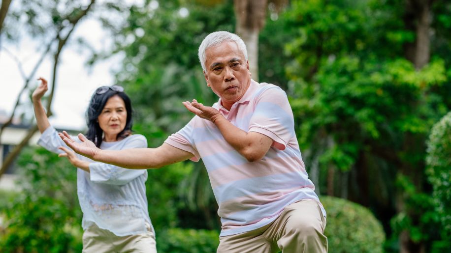 mature couple doing tai chi
