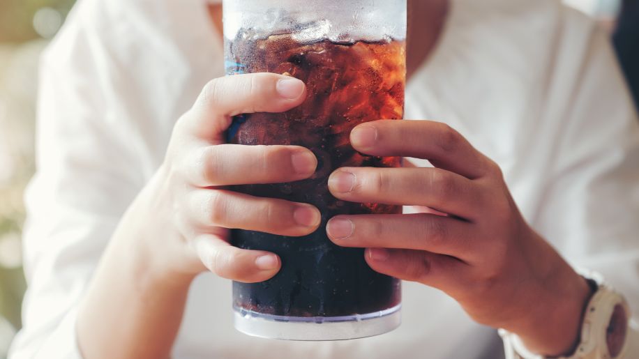 Woman holding soda