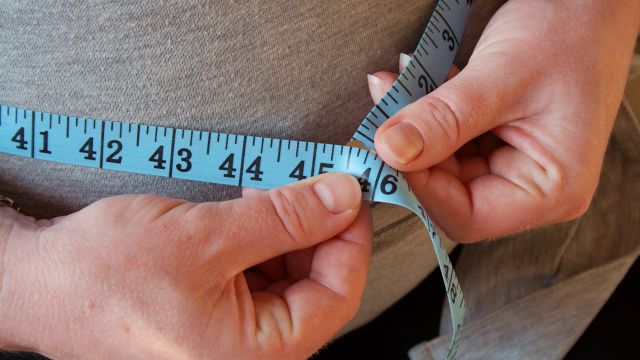 measuring waist, tape measure