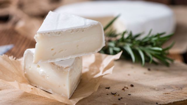 Wedges of brie cheese, which can be made with raw or pasteurized milk, is one type of food to avoid when pregnant.