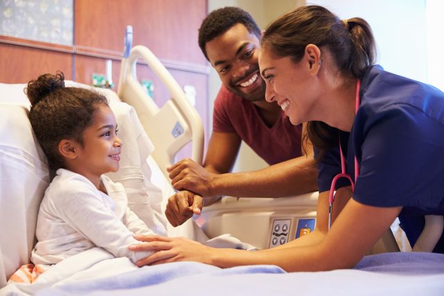 child in hospital bed