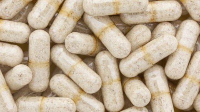 Ground psyllium in clear capsules is taken as a dietary fiber supplement. At certain dose levels this all natural supplement is taken as a cholesterol reducer.