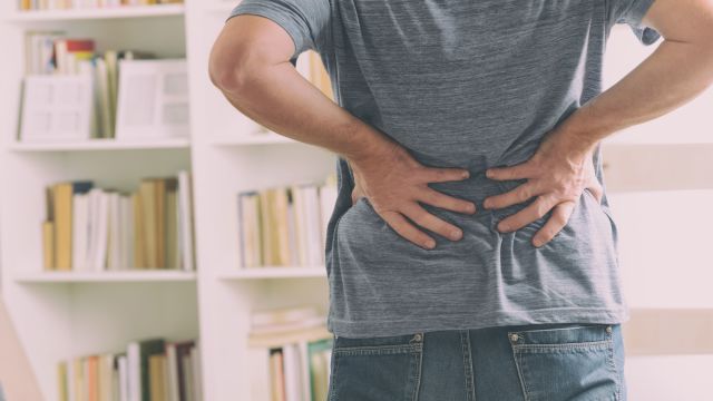 back pain, man experiencing back pain