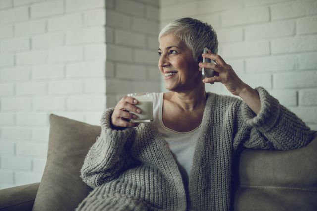 senior woman drinking milk