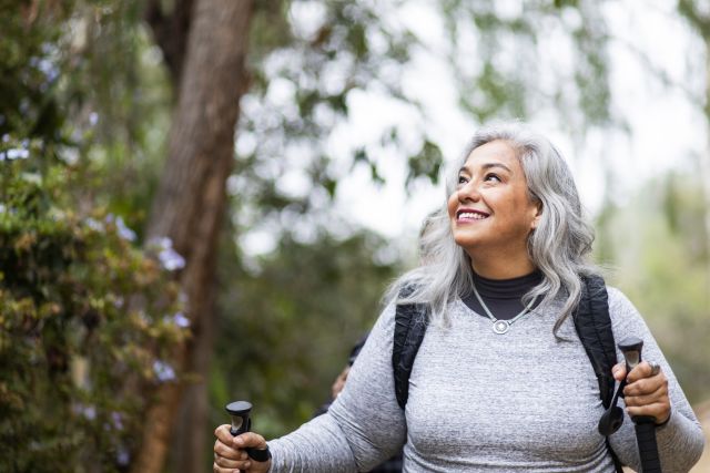 senior white-haired woman hiking