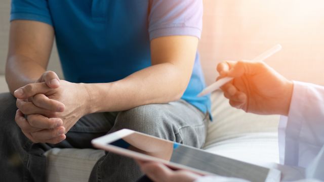 doctor using tablet computer