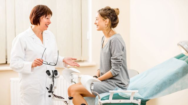 young woman talking to gynocologist