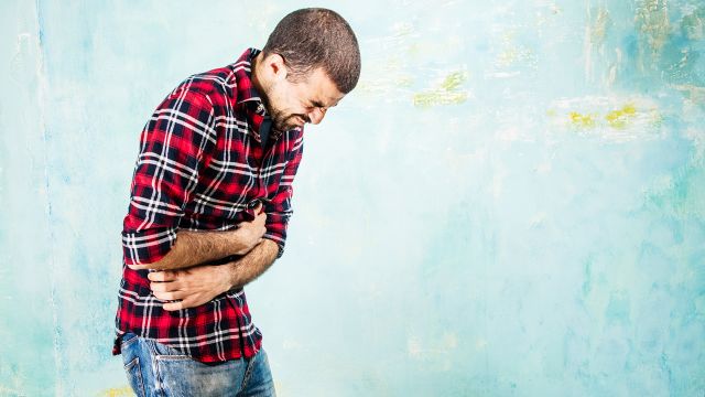 Man experiencing abdominal pain