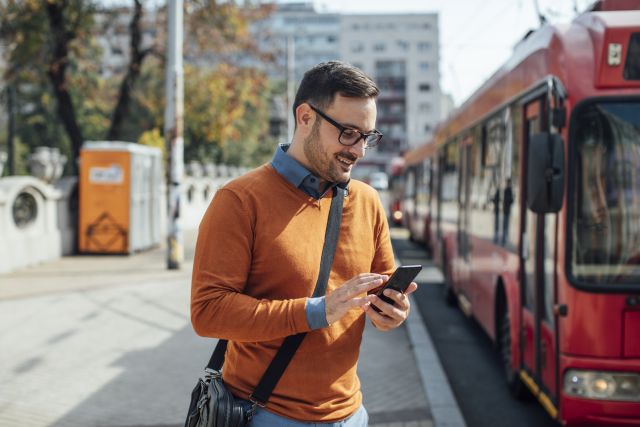man waiting for bus