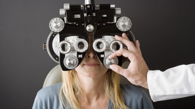A woman during an eye exam. Thyroid eye disease may be treated by a multidisciplinary team of healthcare providers that includes eye doctors and providers who specialize in endocrine disorders.