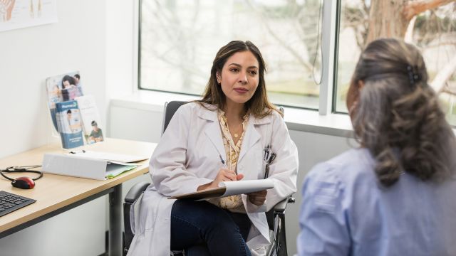 A woman meets with an ENT (ear, nose, and throat) doctor about nasal polyps. Working with the right healthcare provider can mean a much better outcome from treatment.