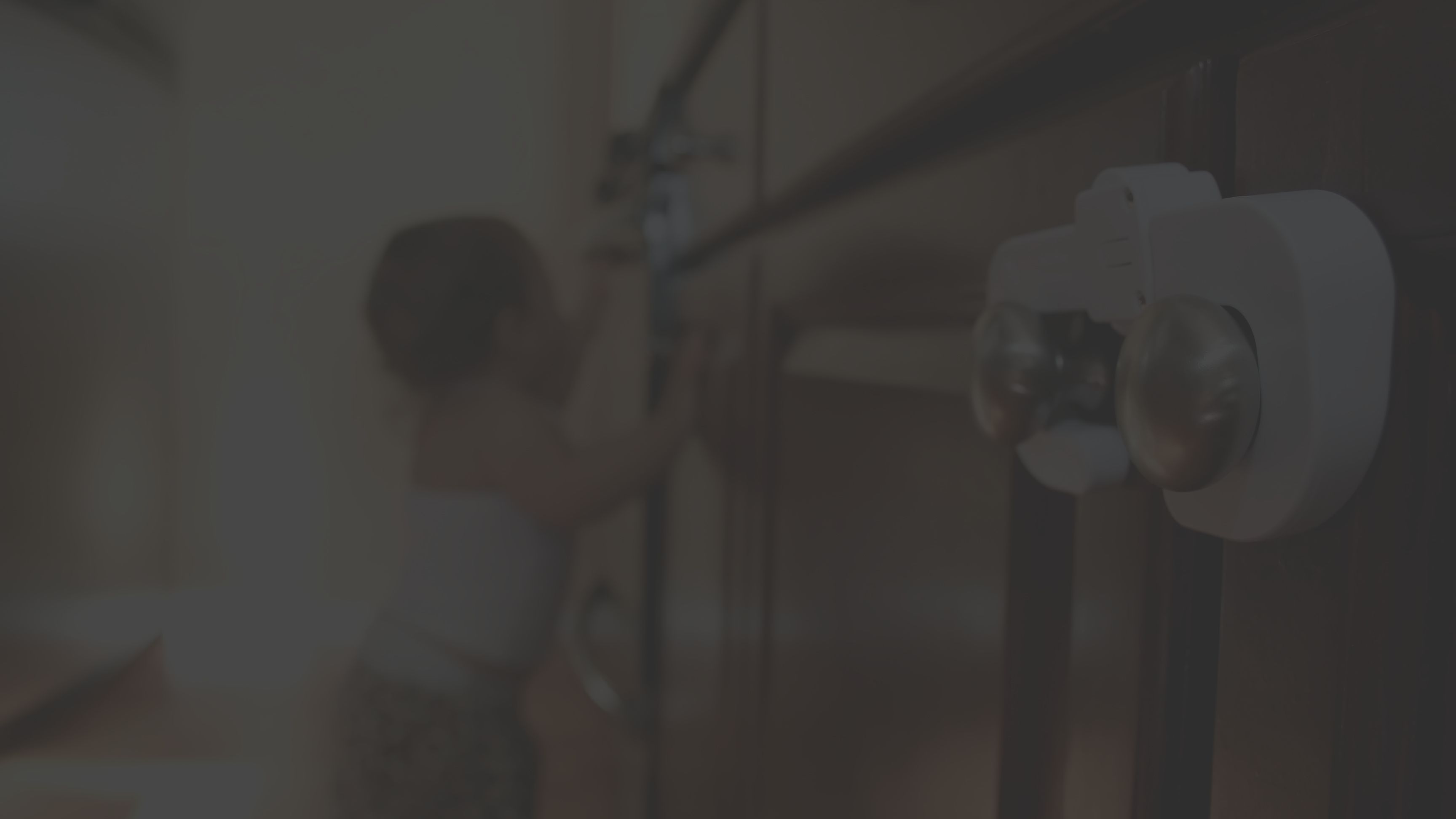 Toddler trying to open kitchen drawers