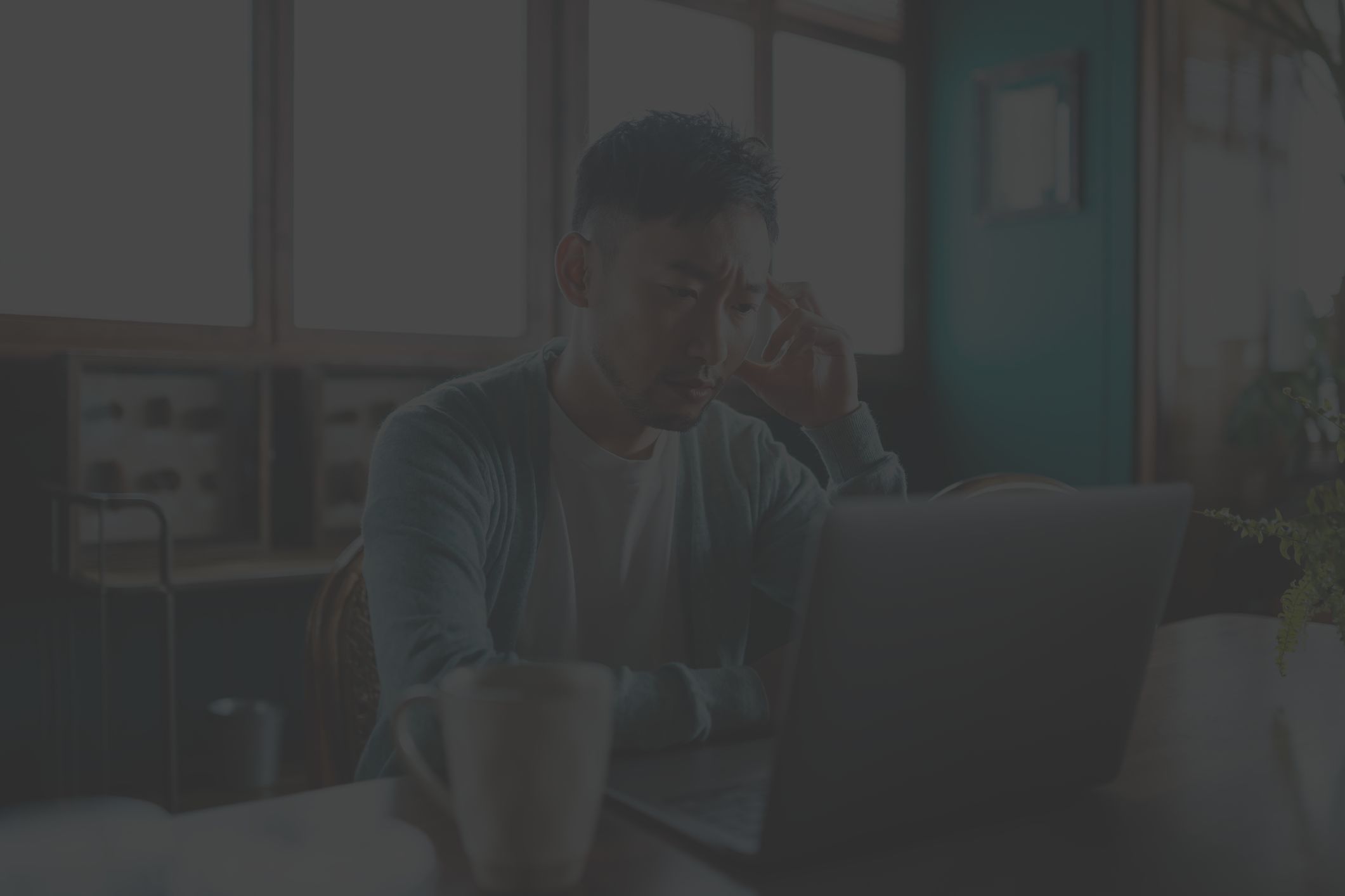 stressed man at computer