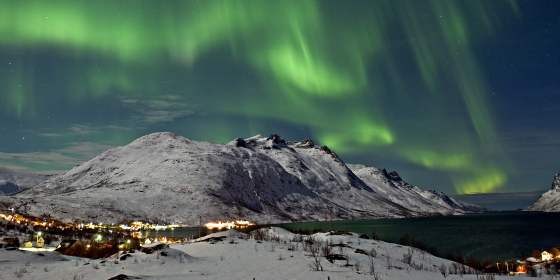 Northern lights over the Ersfjord in Tromsø
