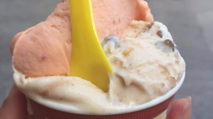 A double scoop of peach and vanilla herbs and spices gelato.